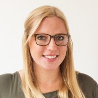 Anna Schmidt - People & Culture Manager: Smiling woman with long blonde hair; darker, glasses and freckles.